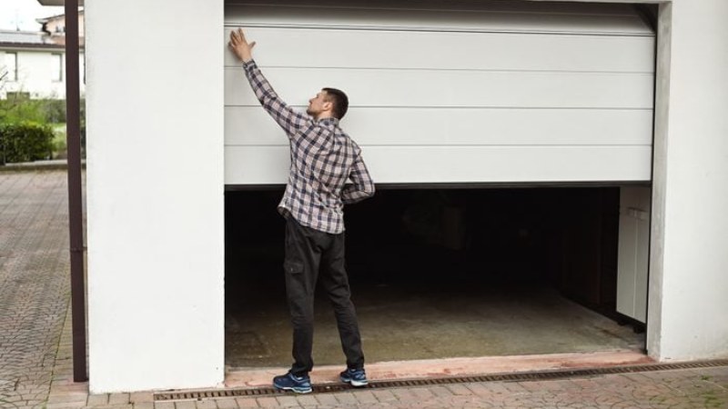 What Homeowners Usually Try Before Calling a Tradesperson for a Garage Door Issue